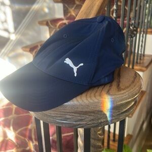 Puma cap navy excellent condition L/XL Navy elastic inside strap. Super soft